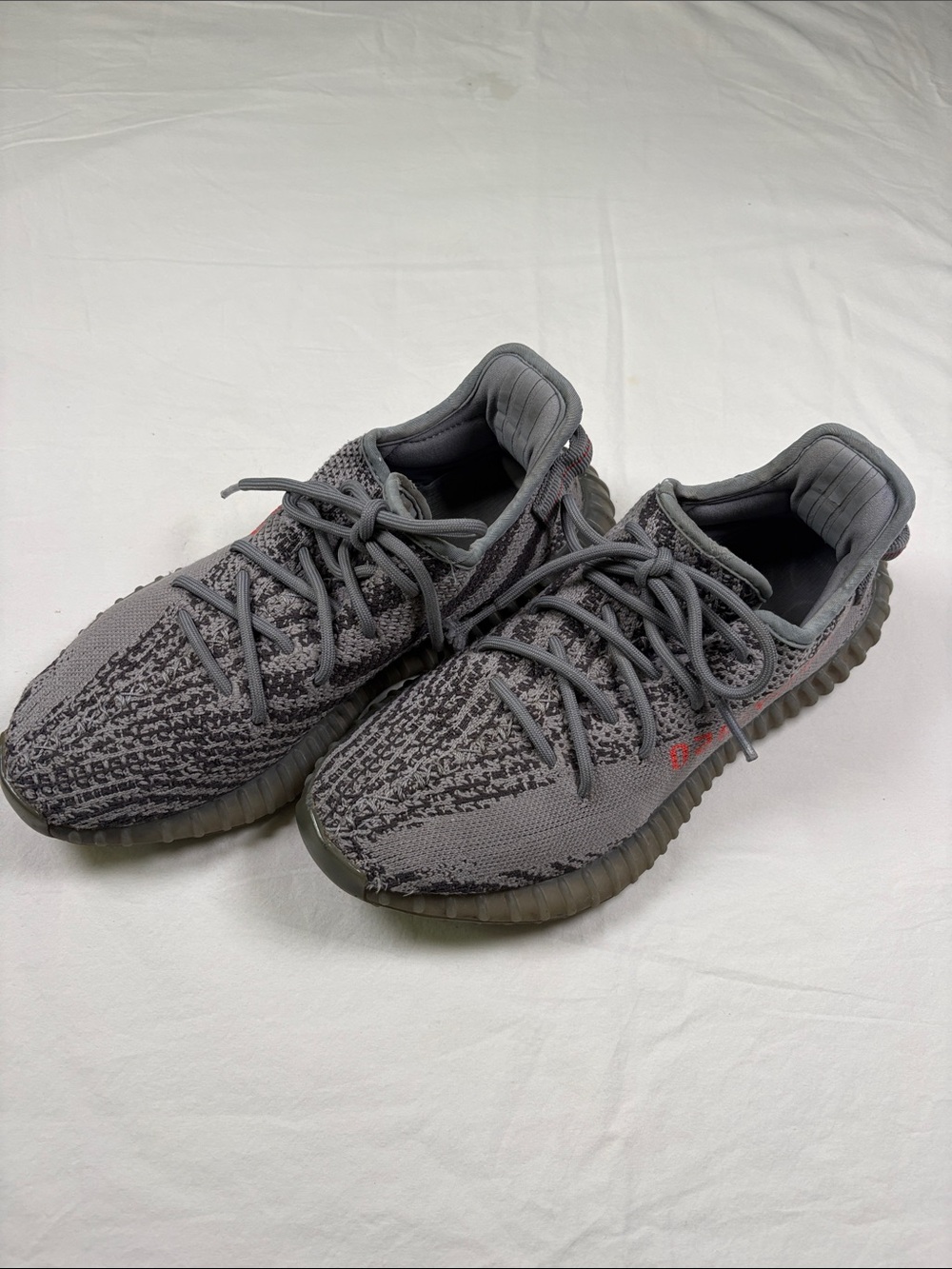 Yeezy Boost 350 V2 Gray Knit Sneakers with Subtle Red Accent